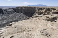 this rock formation looks to be part of a massive canyon on the rim of a mountain