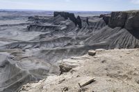 this rock formation looks to be part of a massive canyon on the rim of a mountain