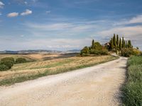 Rugged Dirt Road in Tuscany under Clear Sky