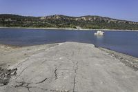 Rugged Highland Landscape with Clear Sky and Azure Lake