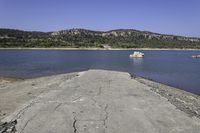 Rugged Highland Landscape with Clear Sky and Azure Lake