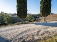 Rugged Landscapes in Tuscany with Clear Sky and Sand Street