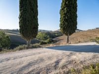 Rugged Landscapes in Tuscany with Clear Sky and Sand Street