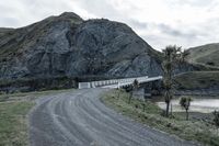 Rugged Mountain Road Bridge Over River