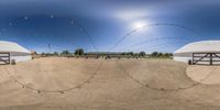 the view of an outside barn and courtyard in a 3d - generated picture with a camera and mirror