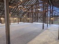 Rural Barn Interior with Open Space and Elevated Wood Floor