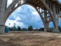 a construction scene of the roadway overpass near an intersection that is under construction, with a sky background