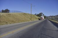 a deserted road has been closed and is mostly empty or is not yet to be used