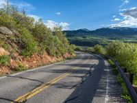 Scenic Road in Rural Colorado with Pikes Peak