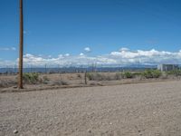 Rural Landscape in Colorado: Dirt Road to a Power Plant