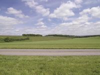 Rural Landscape: Green Pastures and Rolling Hills
