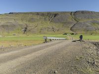 Rural Landscape with Mountain and Road in Iceland