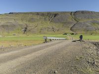 Rural Landscape with Mountain and Road in Iceland