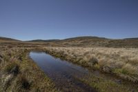 Rural Landscape: Mountains and Water Reflection