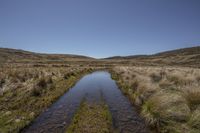 Rural Landscape with Mountains and a Watercourse