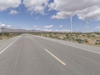 Road Through a Rural Landscape: Fields and Clear Skies