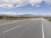Road Through a Rural Landscape: Fields and Clear Skies