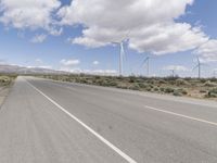 Road Through a Rural Landscape: Fields and Clear Skies