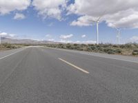 Road Through a Rural Landscape: Fields and Clear Skies