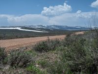 Rural Landscape in Utah: Dirt Road Leading to a Beautiful Lake