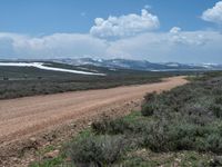 Rural Landscape in Utah: Dirt Road Leading to a Beautiful Lake