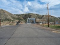 Rural Landscape in Utah: A Straight Road and a Bridge