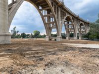 an empty park and bridge is under construction in the country side of los angeles ca