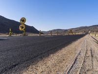 Rural Plain: A Road Lined with Vibrant Vegetation