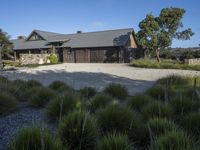 an elegant garage and driveway at an estate on the mountain top above nap valley, california