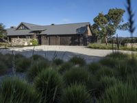 an elegant garage and driveway at an estate on the mountain top above nap valley, california