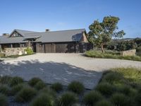 an elegant garage and driveway at an estate on the mountain top above nap valley, california