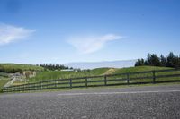 Rural Road with Smooth Asphalt and Contrails: A Scenic View