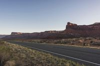 Rural Road: Asphalt Through Rugged Terrain