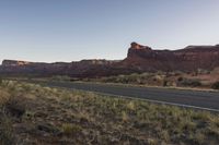 Rural Road: Asphalt Through Rugged Terrain