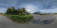 360 - view of road and building in countryside area with trees on both sides of it