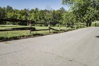 Rural Road Under Clear Sky: A Serene Landscape