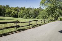 Rural Road Under Clear Sky: A Serene Landscape