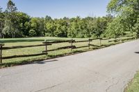Rural Road Under Clear Sky: A Serene Landscape