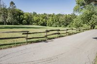 Rural Road Under Clear Sky: A Serene Landscape