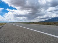 Rural Road in Colorado: Captivating Landscape under Clear Skies