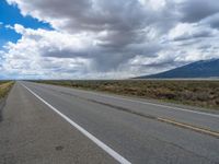 Rural Road in Colorado: Captivating Landscape under Clear Skies