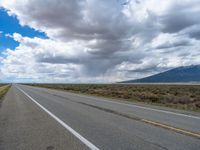 Rural Road in Colorado: Captivating Landscape under Clear Skies