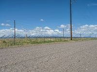 Rural Road in Colorado: Surrounded by Nature and Scenic Landscape