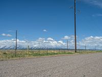 Rural Road in Colorado: Surrounded by Nature and Scenic Landscape