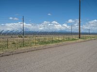 Rural Road in Colorado: Surrounded by Nature and Scenic Landscape