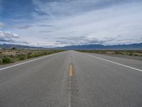 Rural Road in Colorado: Scenic Mountain Views