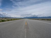 Rural Road in Colorado: Scenic Mountain Views