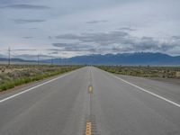 Rural Road in Colorado: Scenic Mountain Views