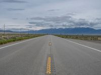 Rural Road in Colorado: Scenic Mountain Views