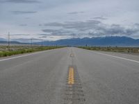 Rural Road in Colorado: Scenic Mountain Views